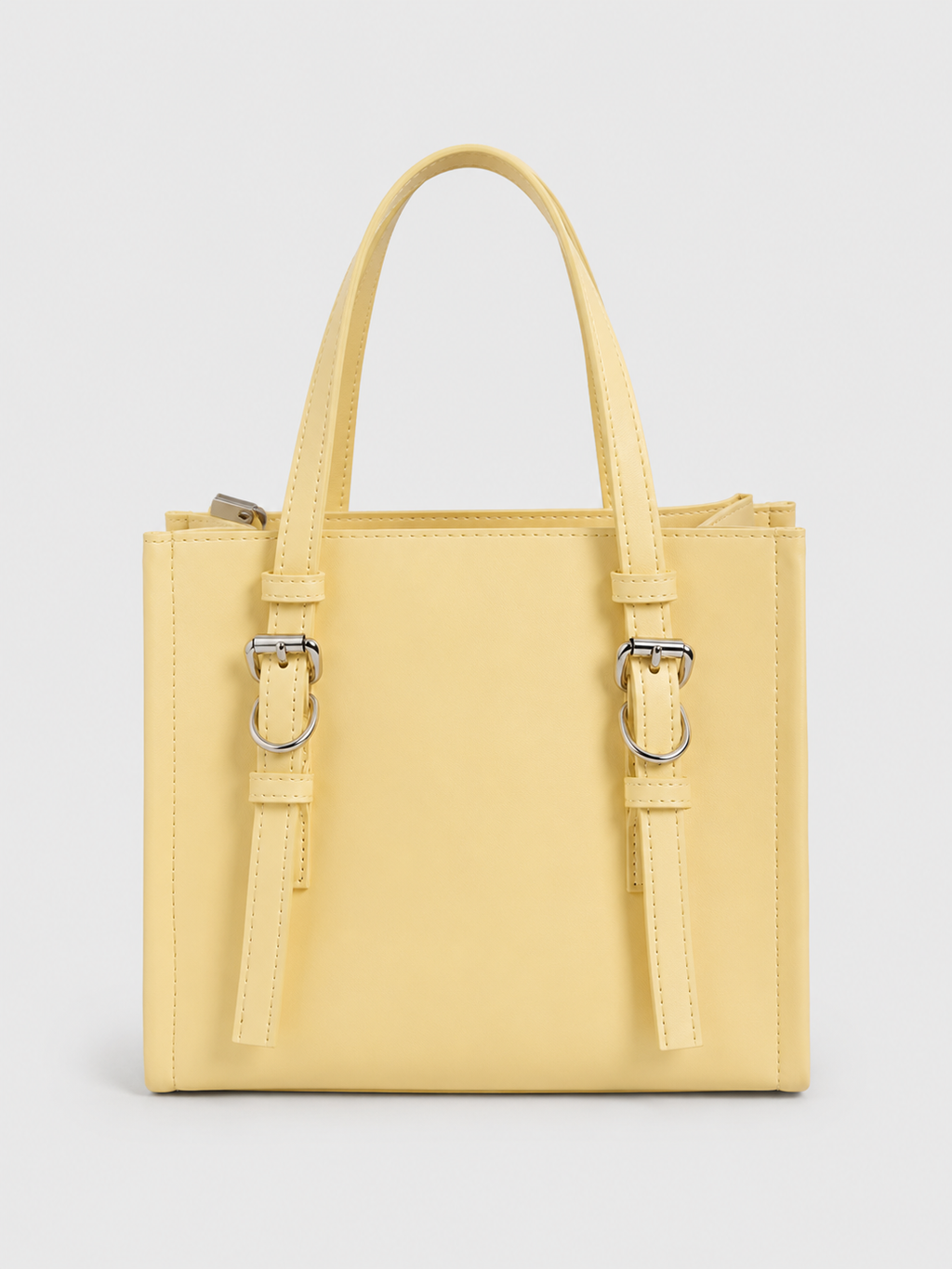 Sac à main élégant avec boucles décoratives