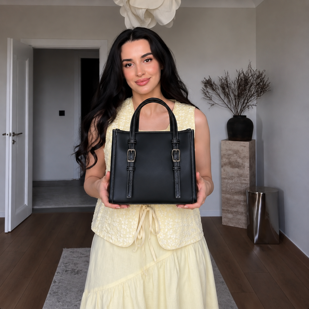 Sac à main élégant avec boucles décoratives