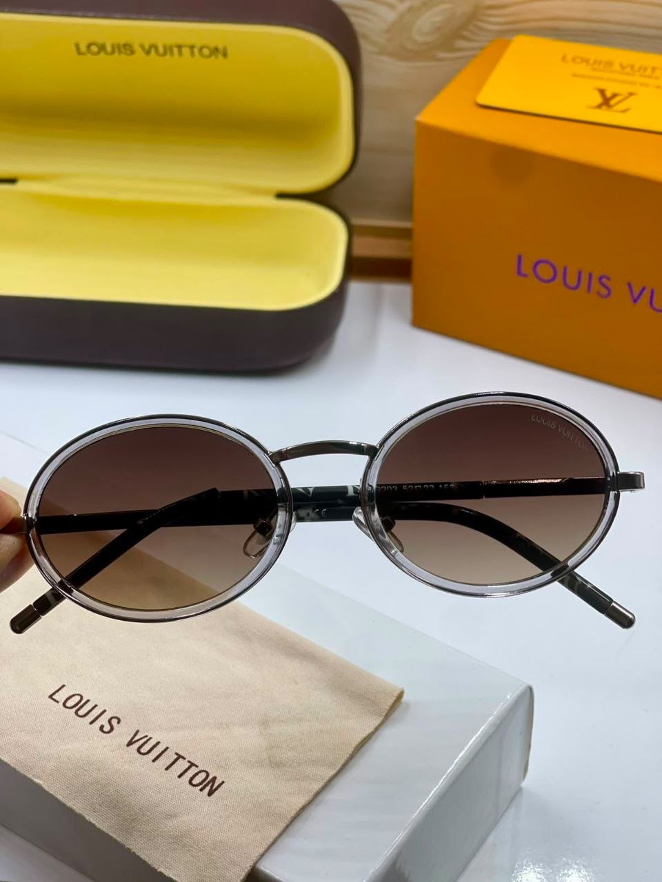 LOUIS VUITTON Signature Oval