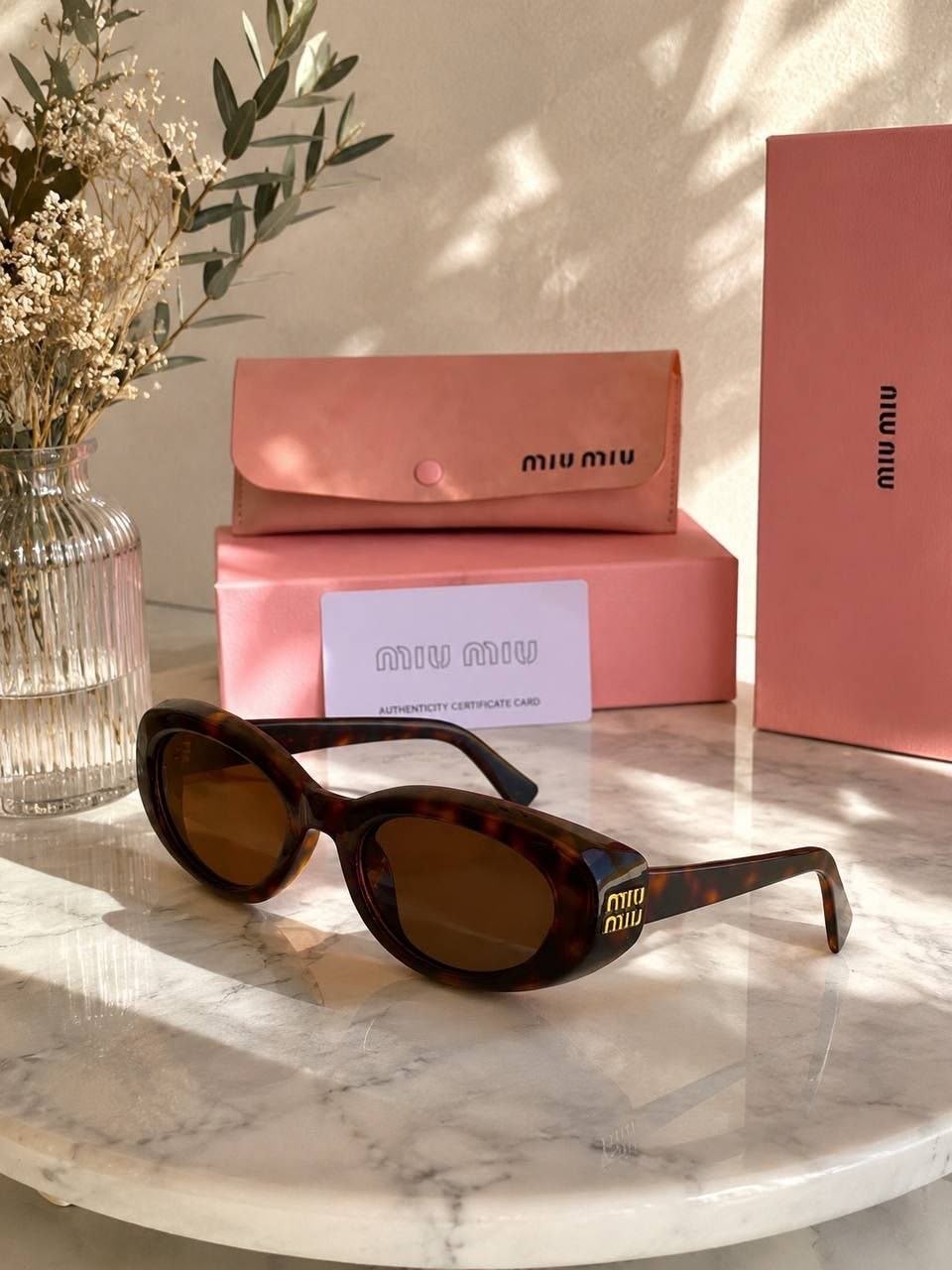 Miu Miu Collection Premium